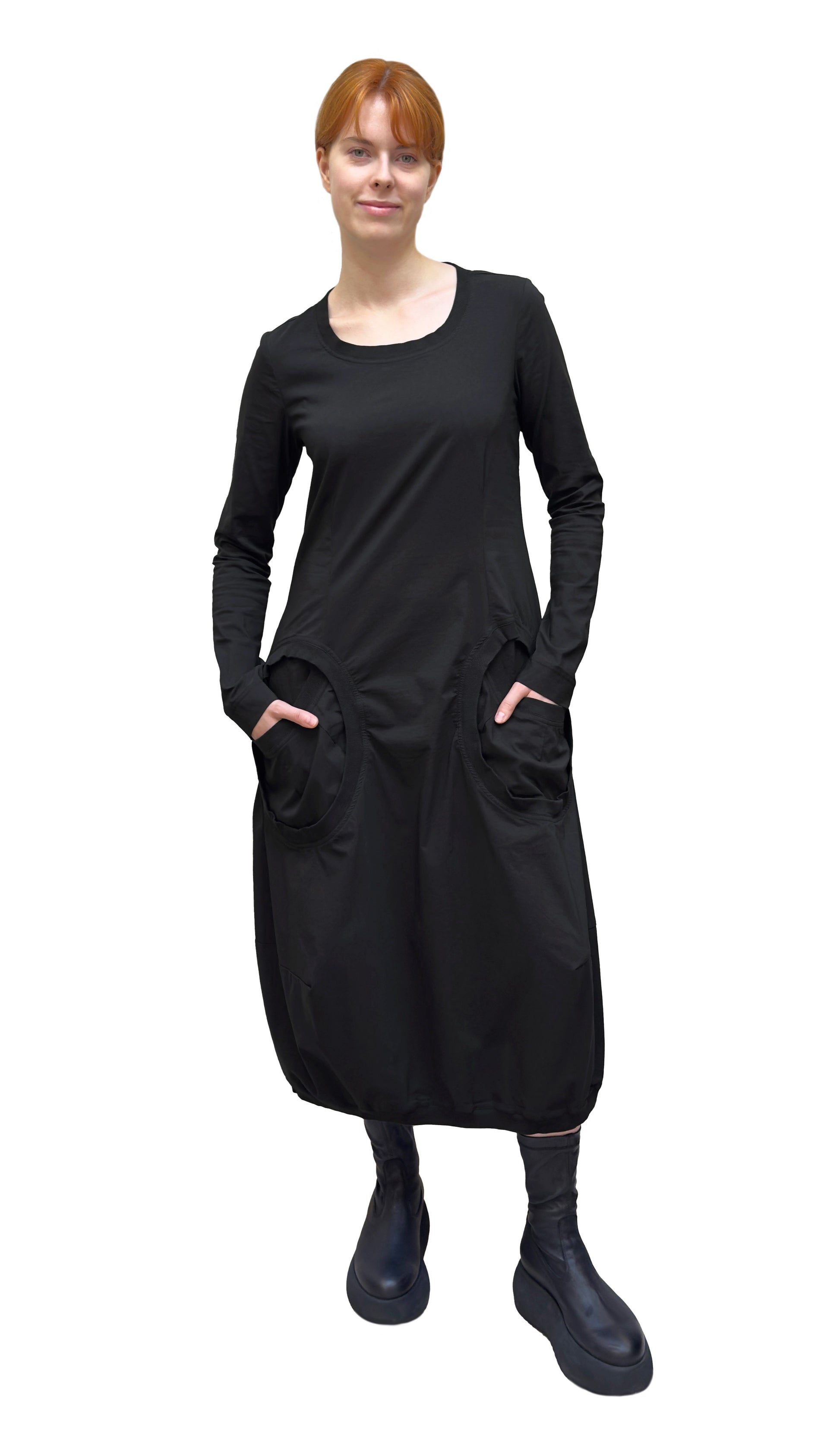Women's long sleeve, round neck A-line dress with circular in-set front pockets. Made in a technical fabric from Black Label. In colour Black. Front view. 