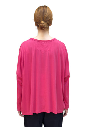 Women's round neck, long sleeve boxy relaxed tee from Black Label. In colour lotus with black floral graphic. Back view.