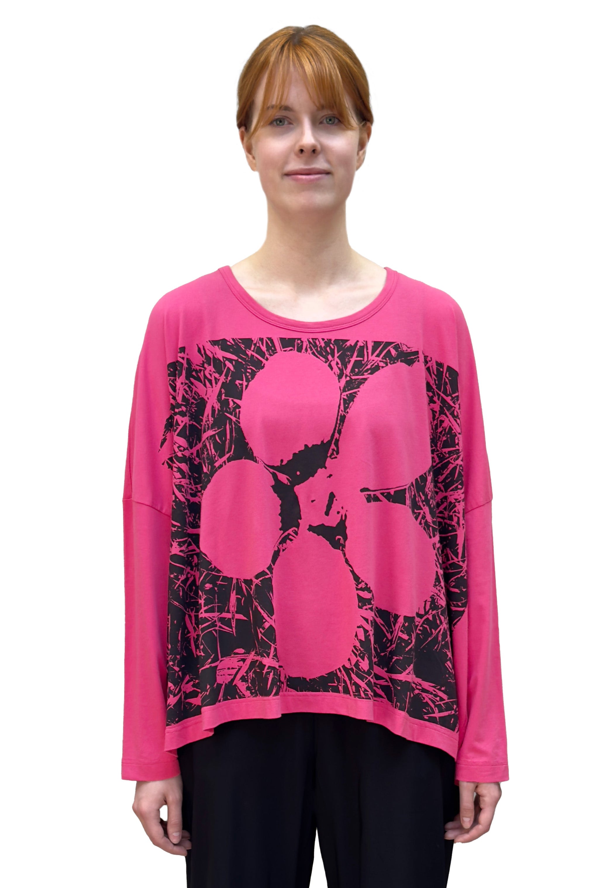Women's round neck, long sleeve boxy relaxed tee from Black Label. In colour lotus with black floral graphic. Front view.
