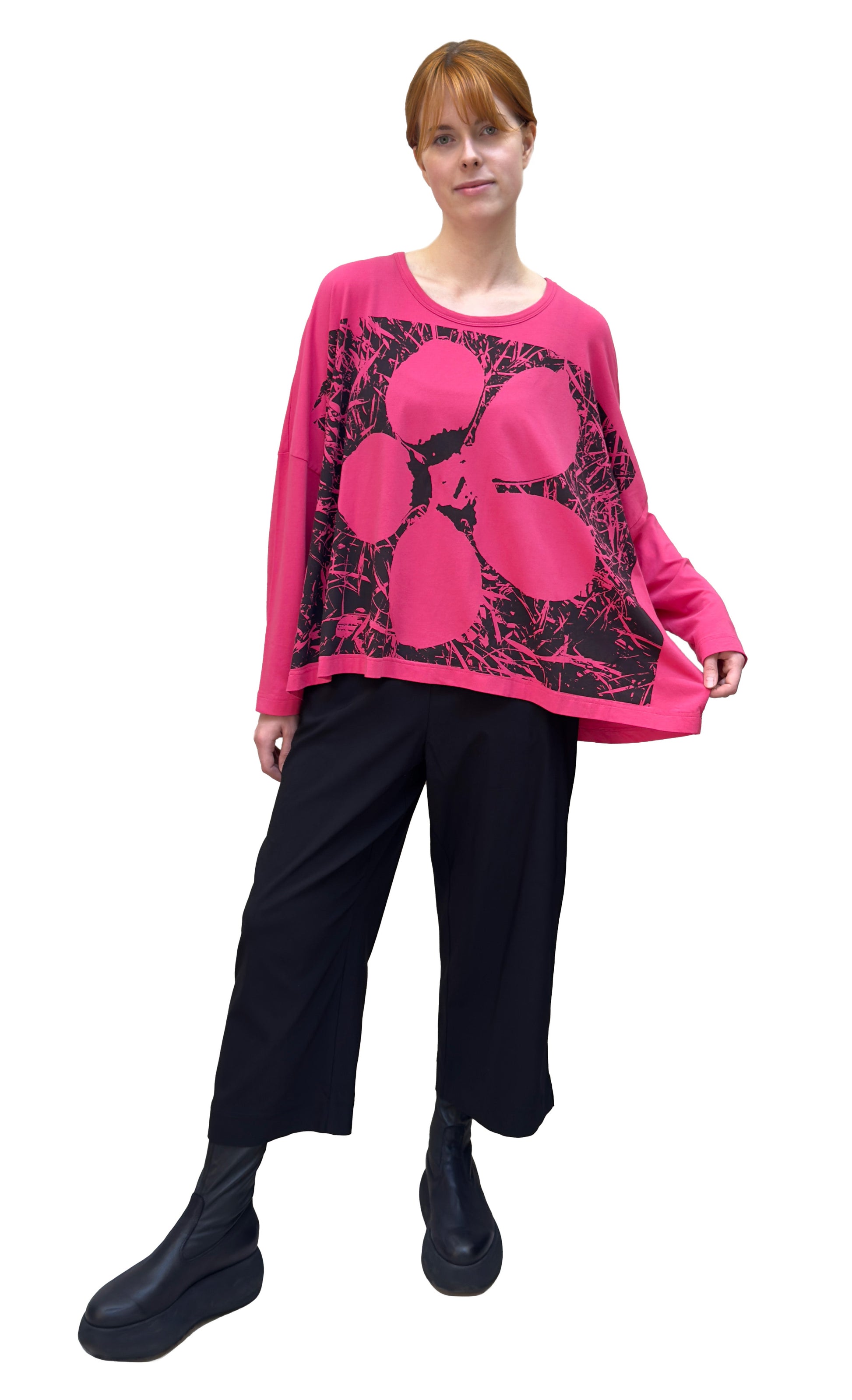 Women's round neck, long sleeve boxy relaxed tee from Black Label. In colour lotus with black floral graphic. Full model view.