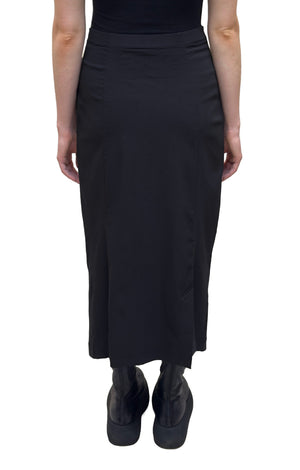 Women's ankle length fitted pencil skirt with a flat elastic waistband. Made in a technical fabric from Black Label. In colour black. back view.