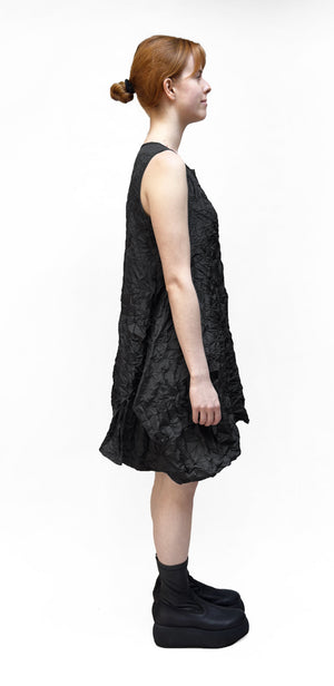 Women's short sleeveless dress from Mama B. Made in Crinkled taffeta fabric. Side view.