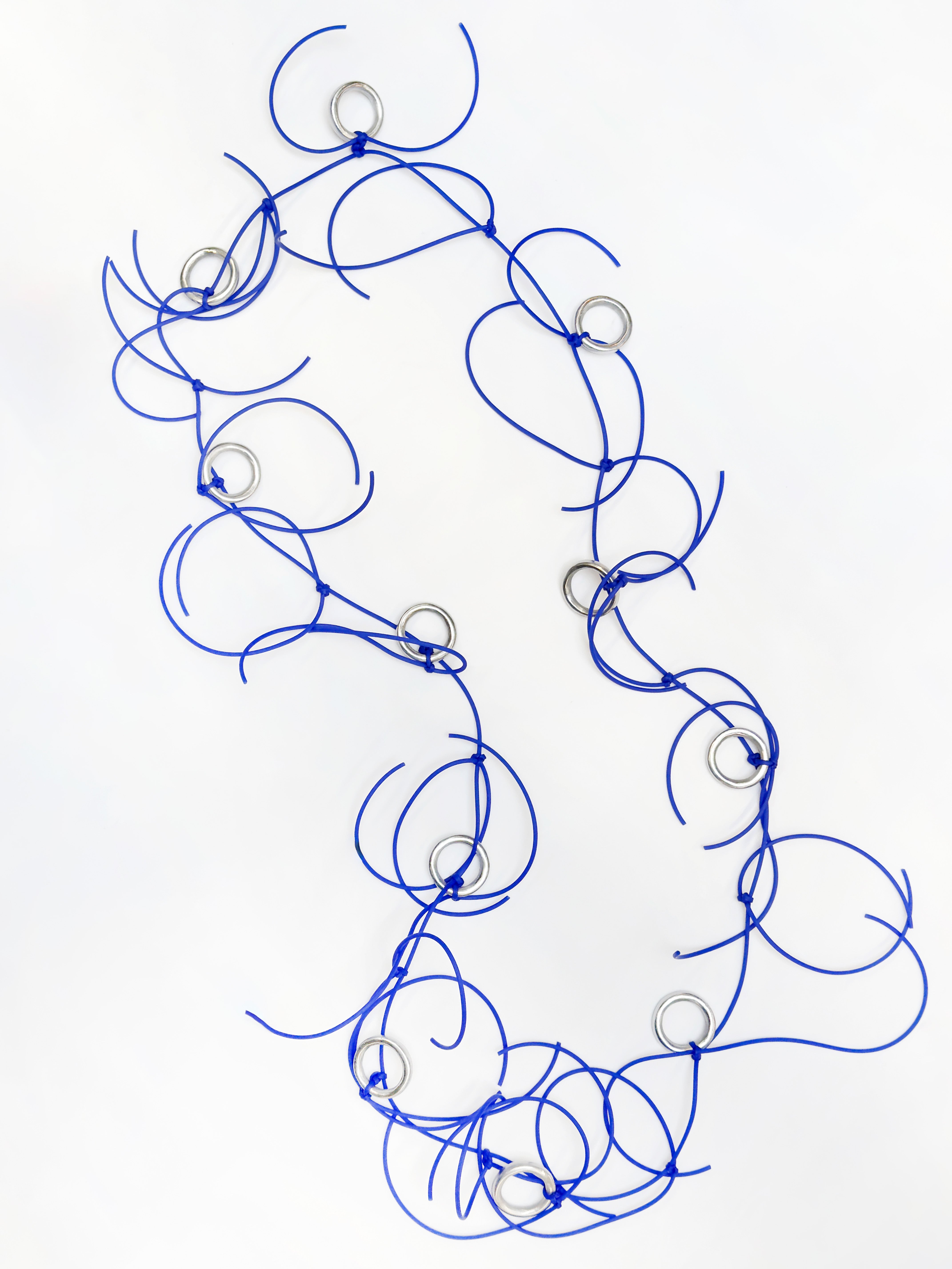 SAMUEL CORAUX Metal Rings and Blue Plastic Cord Necklace