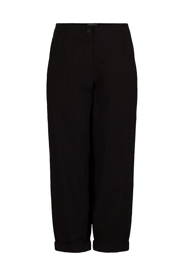 Women's long, cuffed tapered pant, with front button closure, squared pockets, and back elasticized waistband by Oska. In colour black. Front view.